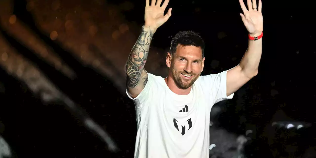 Inter Miami introduces Lionel Messi to cheering fans who braved downpour