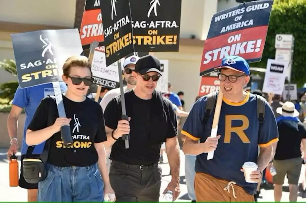 Striking actors join picket lines as Hollywood shuts down