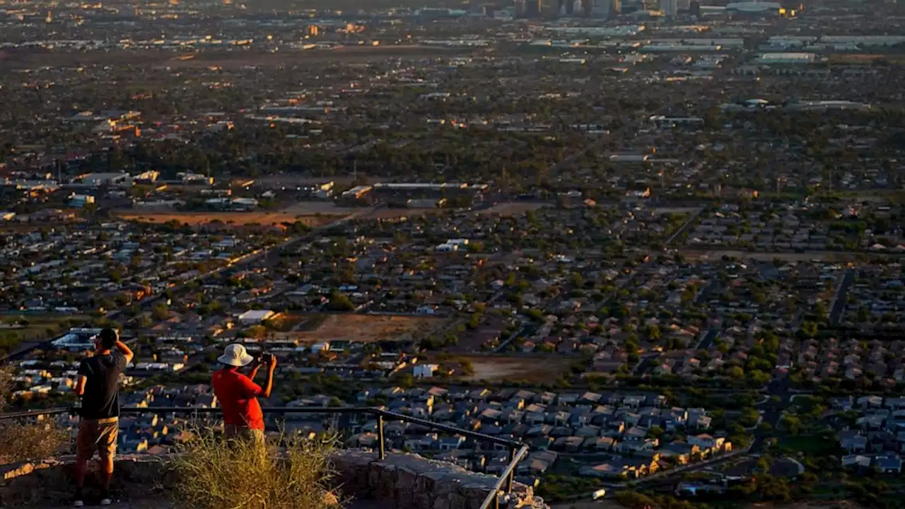 Day and night Phoenix has sweltered from heat that will break a record for American cities