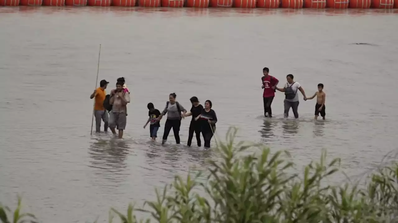 Razor wire-wrapped barrels among 'inhumane' things waiting for migrant families, Chronicle reports