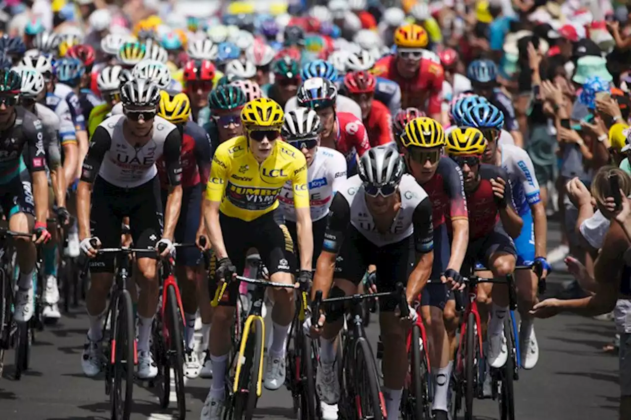 Vingegaard keeps yellow jersey at Tour de France as Poels soloes to victory in 15th stage | The Associated Press