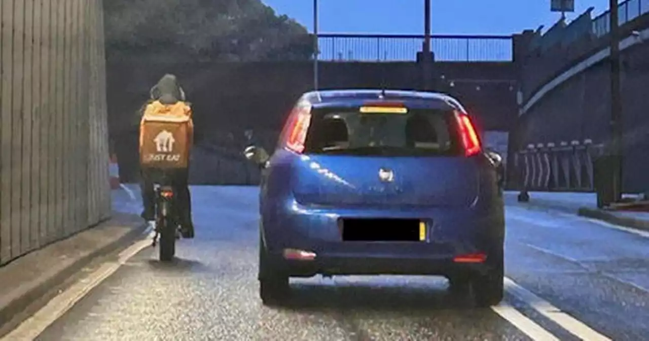 'Just Eat delivery driver' pictured in Clyde Tunnel cycling 'dangerously' close to car