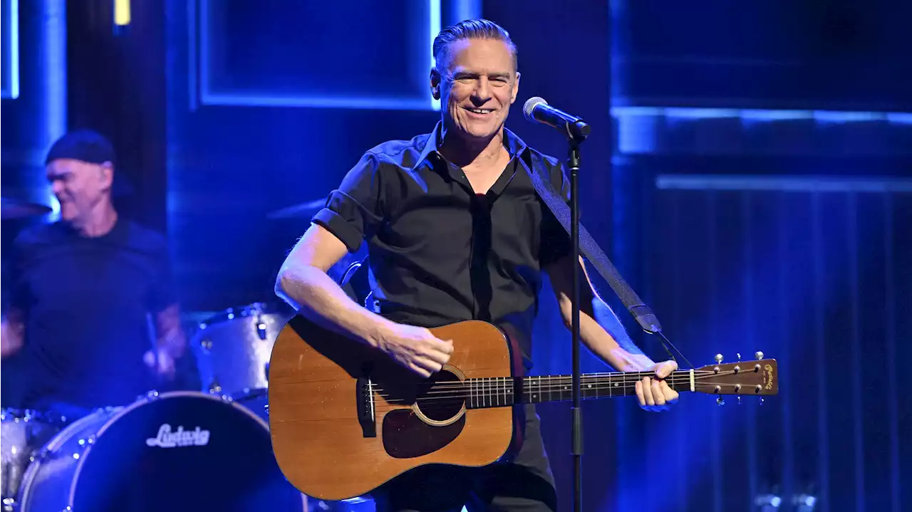 Watch: Fan crashes stage at Bryan Adams concert and takes over mic during 'Summer of '69'