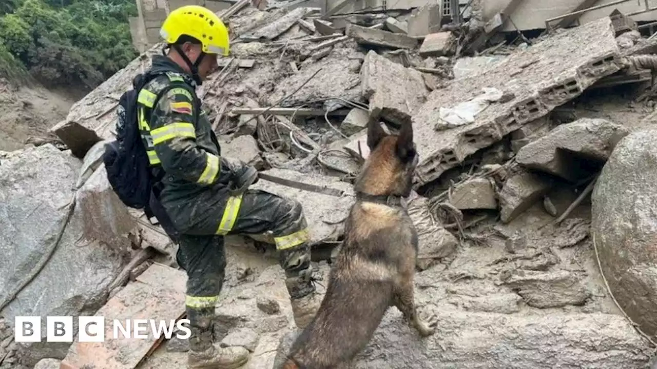 Colombia landslide: Rescuers search for survivors amid mud