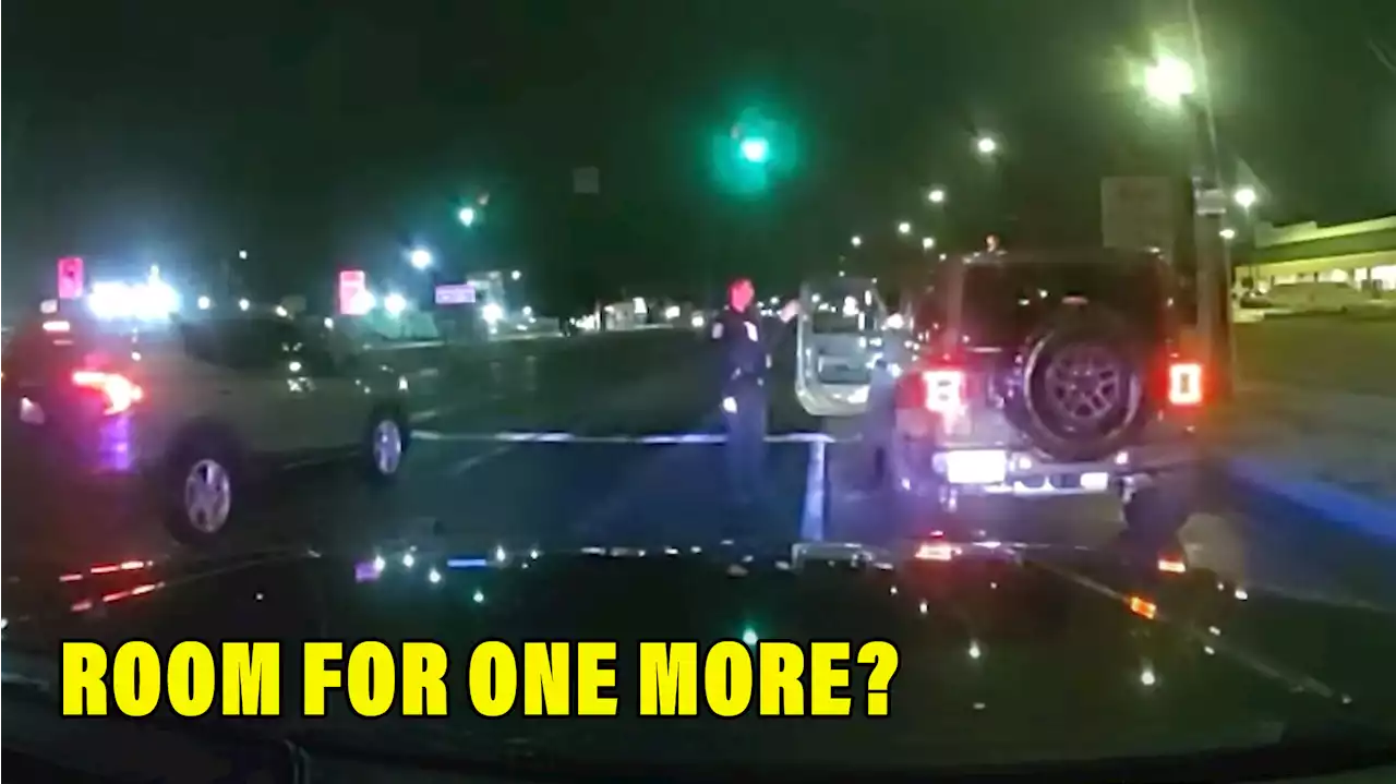 Watch A Cop Cling On To A Stolen Jeep When Driver Flees Traffic Stop | Carscoops