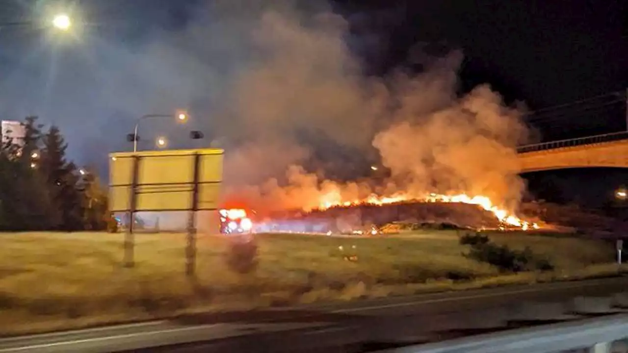 Flames erupt along local freeways overnight