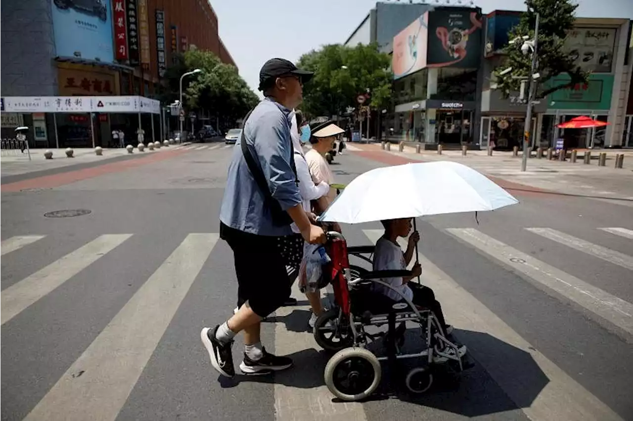 Record heat wave grips China as flood toll rises in South Korea