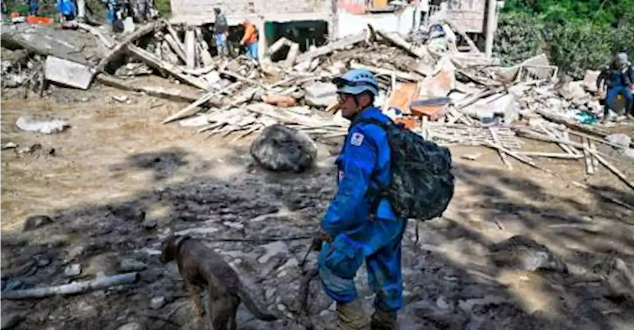 Search for missing paused in Colombia after landslide kills 15