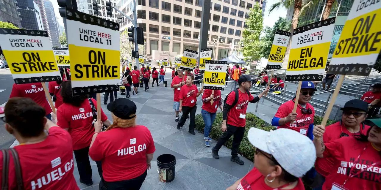 Thousands of Southern California hotel workers strike for better pay and benefits