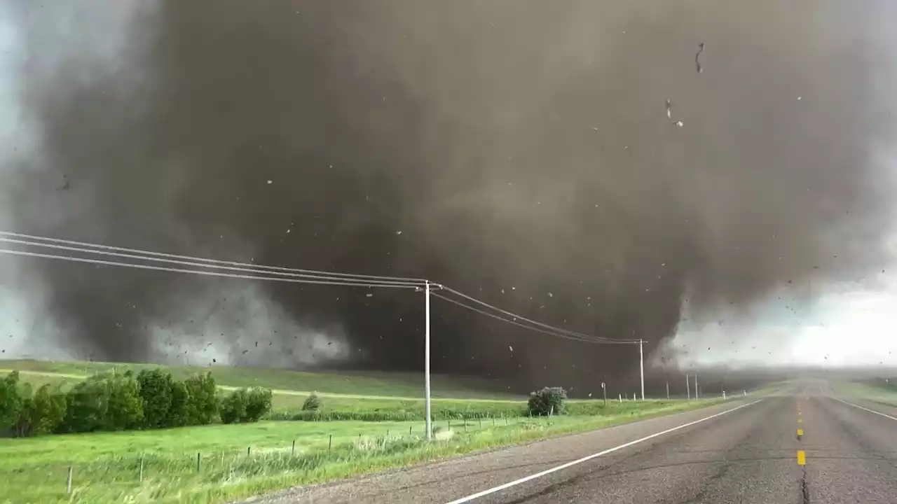 Mountainous Tornado, Debris Cloud Rip Through Alberta - Videos from The Weather Channel