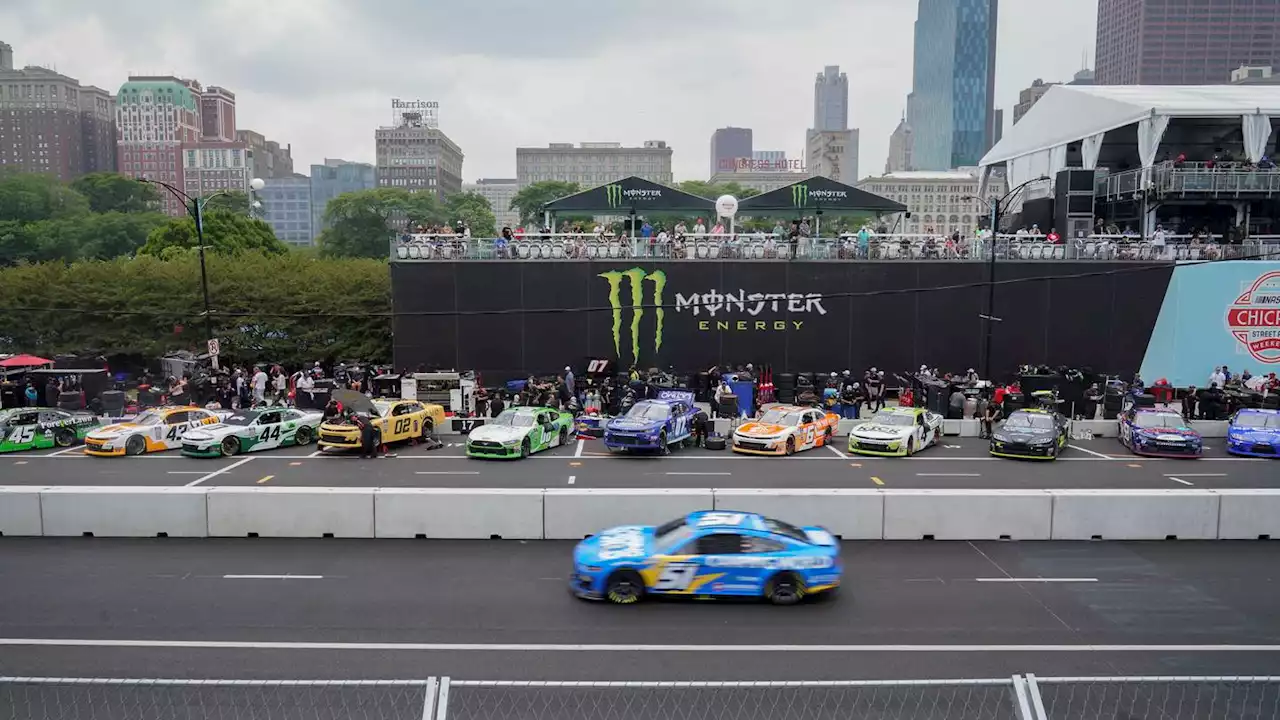 Heavy rains flood Chicago roads, NASCAR ends downtown street race and names winner