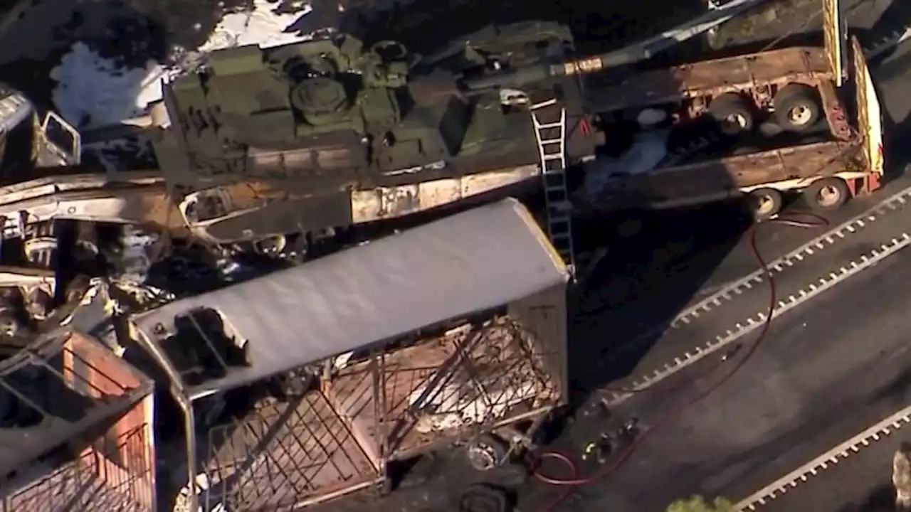 Police 'flabbergasted' no lives lost in fiery crash involving US tank as highway partially reopens