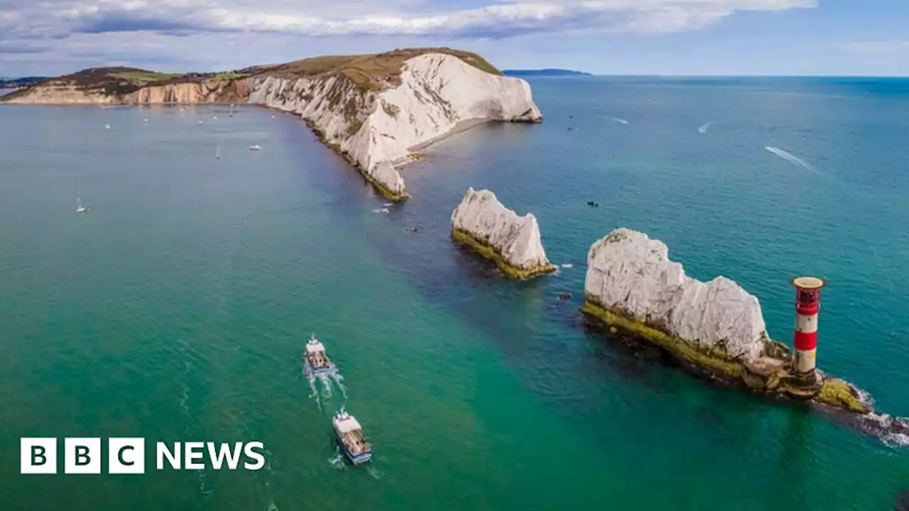 Isle of Wight: Charity swimmers among 14 saved after boat reports hitting wreck