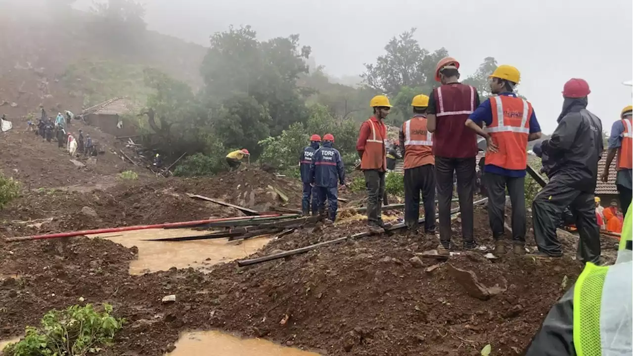 Landslide triggered by heavy rains kills 10 and traps many others in western India