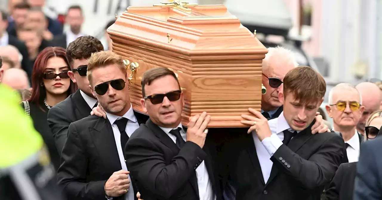 Heartbroken Ronan Keating sings at brother's funeral in emotional eulogy