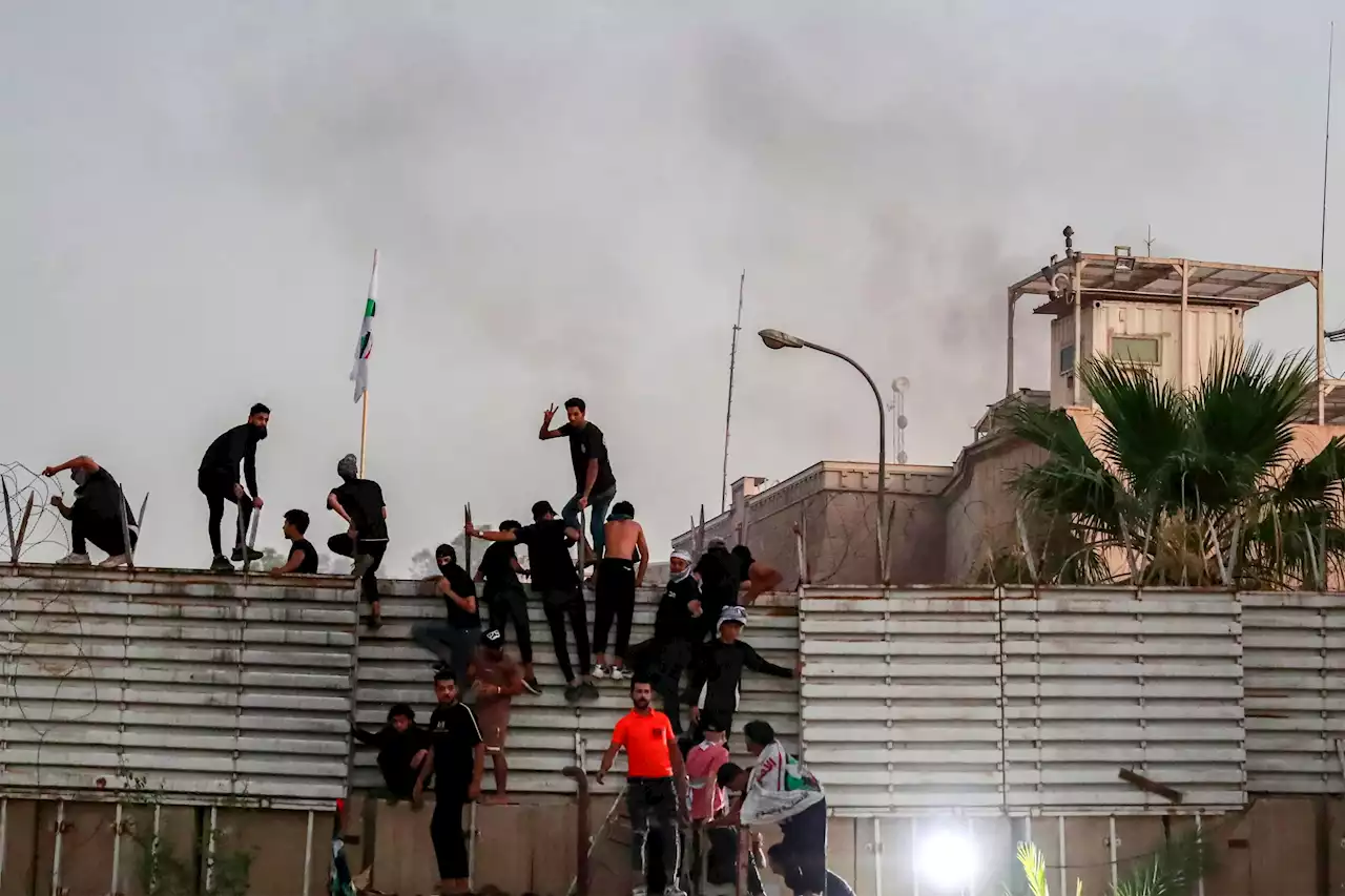 Protestors Angered By Quran Burning Storm Swedish Embassy Compound In Baghdad