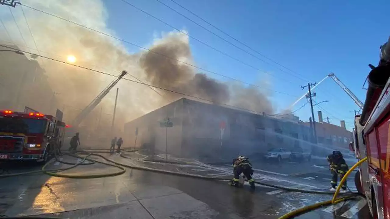 2-alarm building fire burning in Seattle’s Chinatown-International District