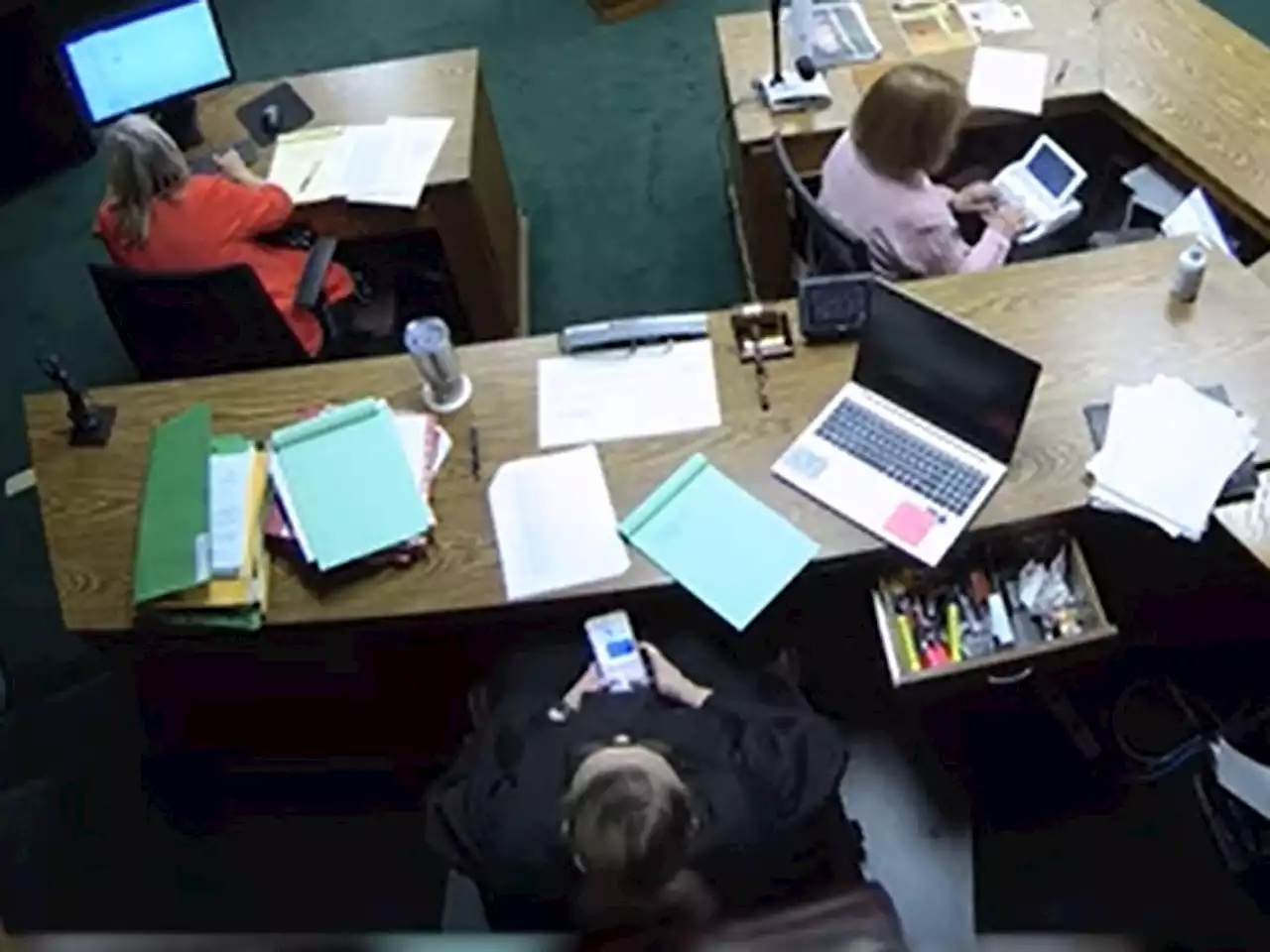 Video shows Oklahoma judge scrolling social media and texting during trial