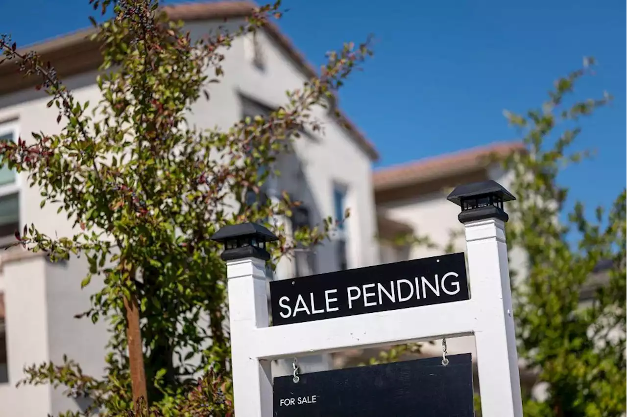 Home prices stay near record high, even as sales drop in June