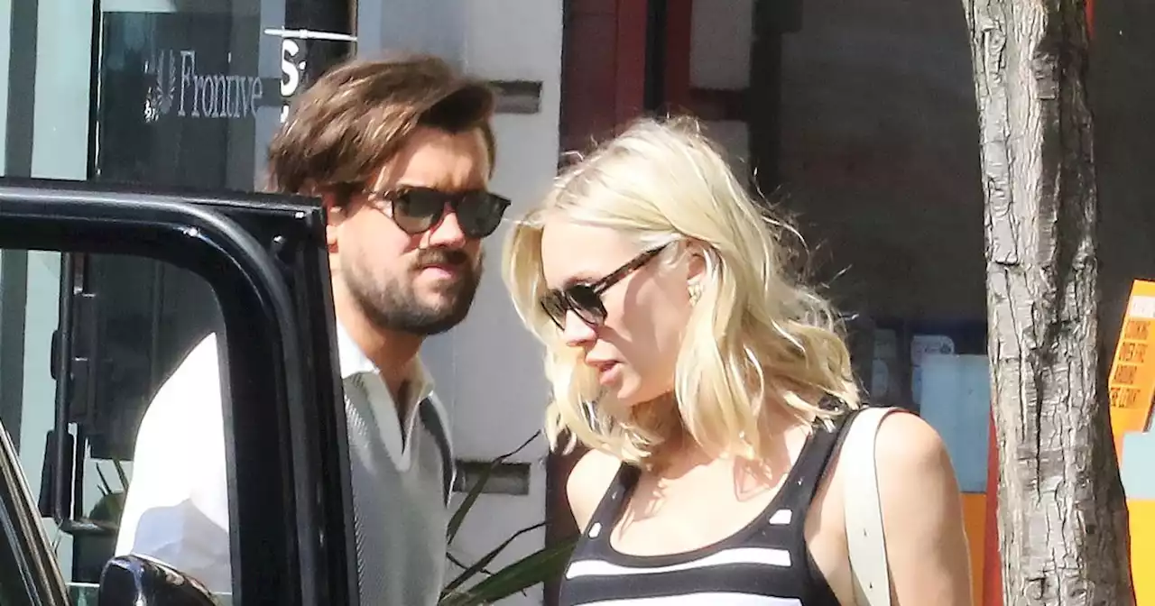 Pregnant Roxy Horner shows off baby bump on shopping spree with Jack Whitehall