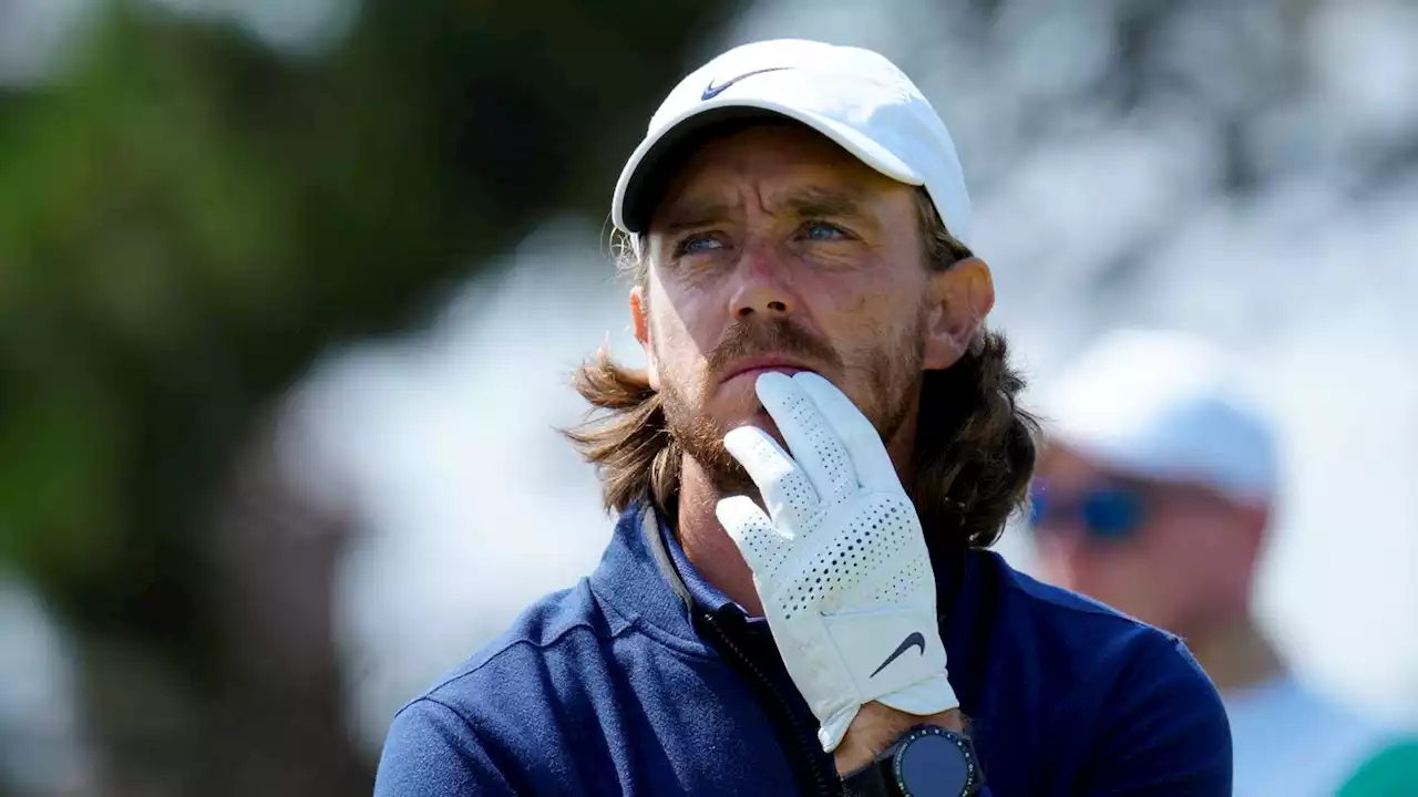 British Open: Tommy Fleetwood holds share of lead as big names struggle