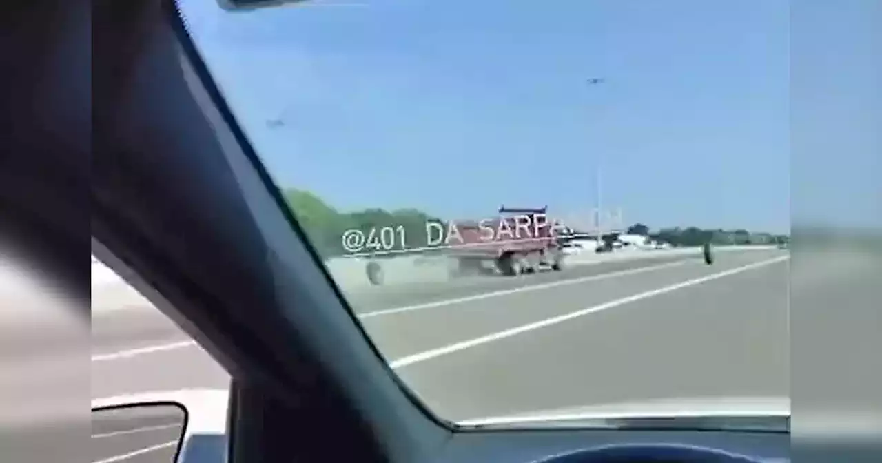 Video shows tire fly off dump truck and casually exit Toronto highway