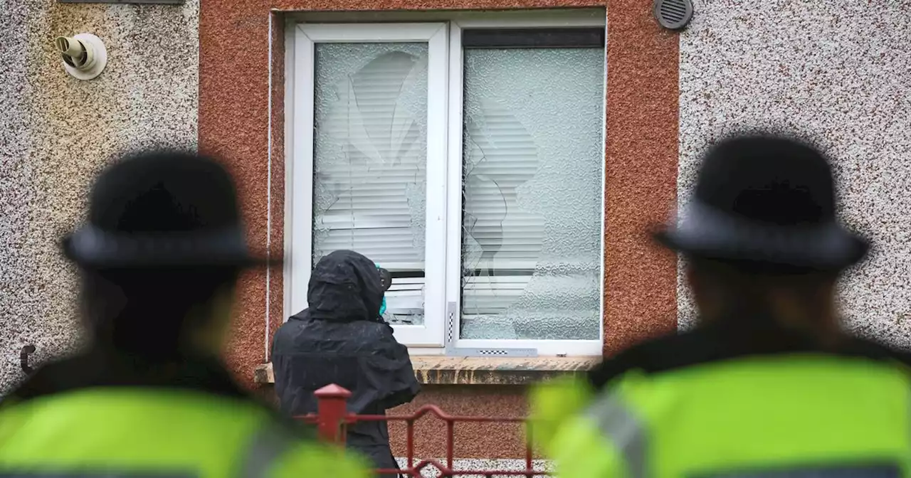 Gang smashes flat windows before 'loud bang' heard