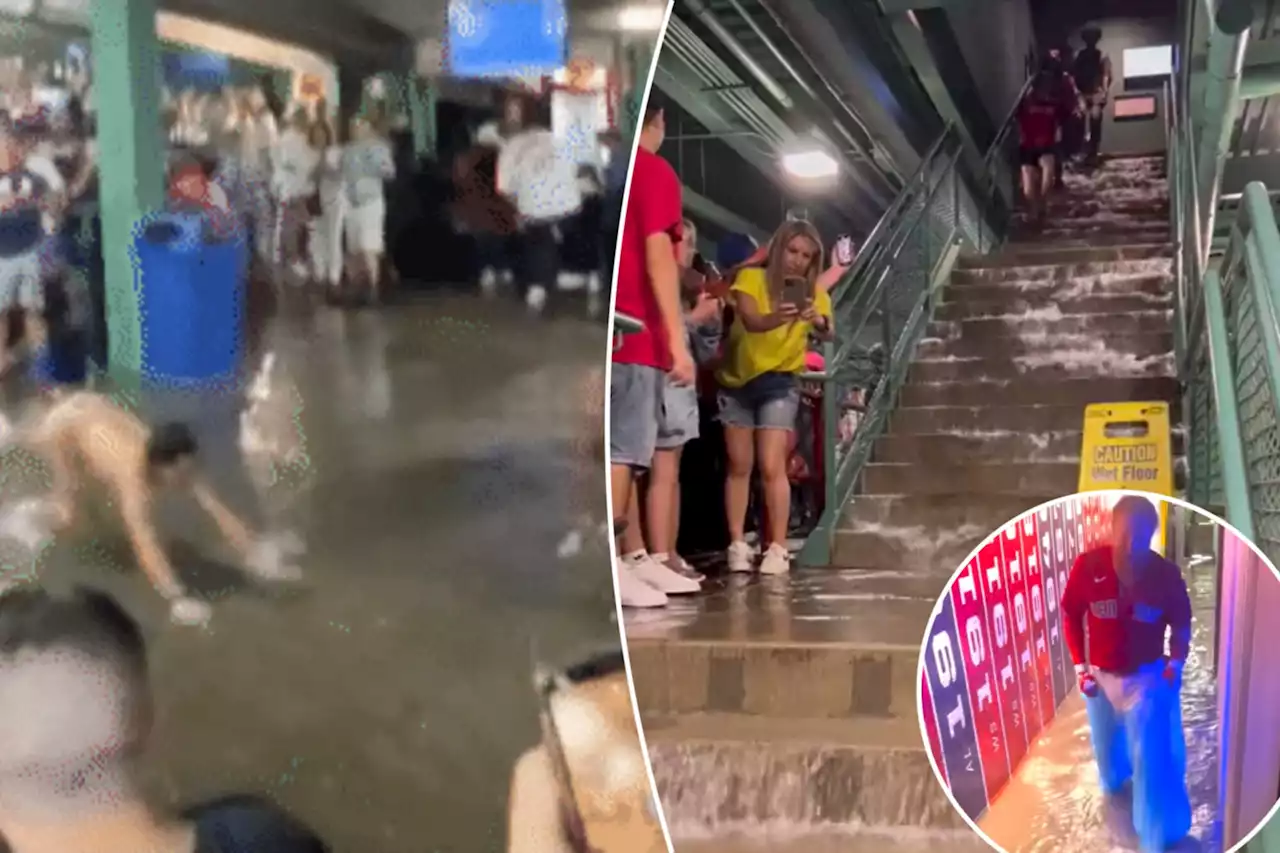 Mets, Red Sox fans turn Fenway into water park as torrential rain floods stadium