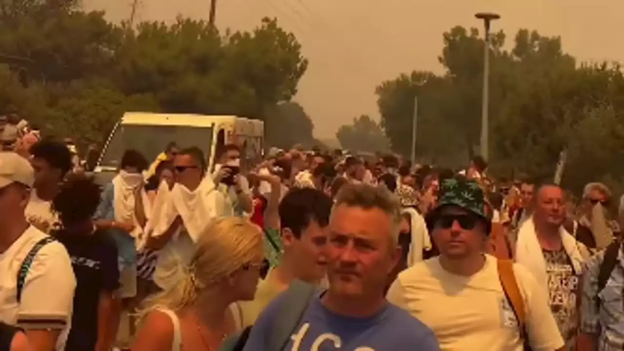 Wildfires on Rhodes force thousands of holidaymakers to flee their hotels