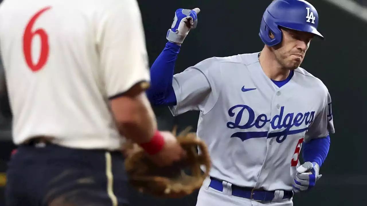 Dodgers beat Texas 11-5 in return to Globe Life Field