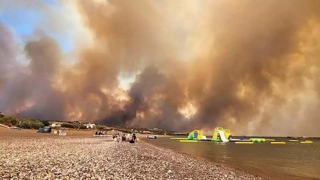 Greek authorities evacuate some 19,000 people as wildfire blazes on the island of Rhodes