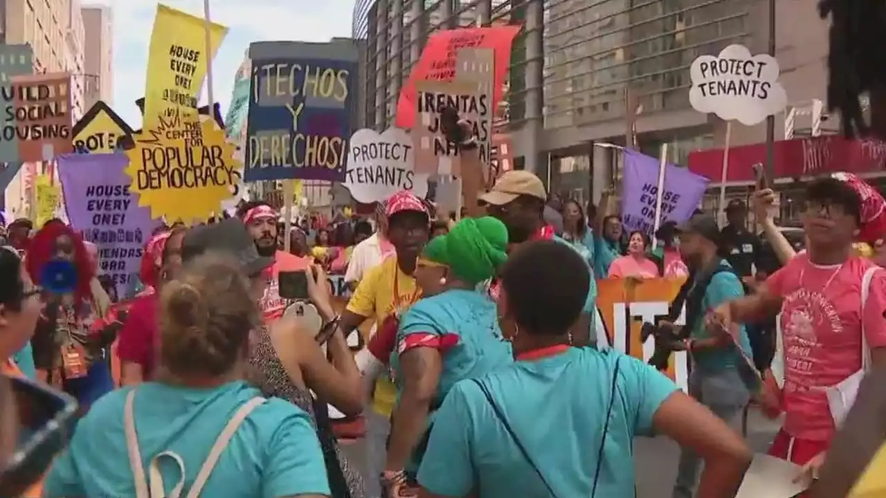 Thousands march on City Hall protesting violent evictions after recent shooting incidents