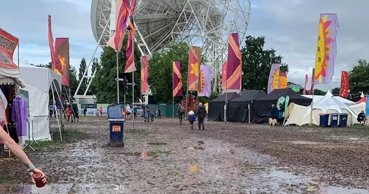 Crowds brave 'mud bath' Bluedot festival as rain sees day tickets cancelled