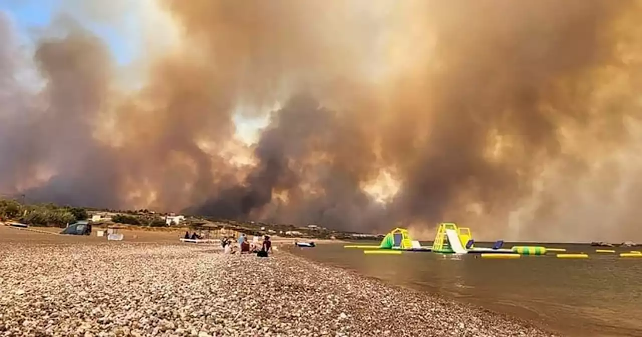 Greek authorities evacuate some 19,000 people as wildfire blazes on the island of Rhodes