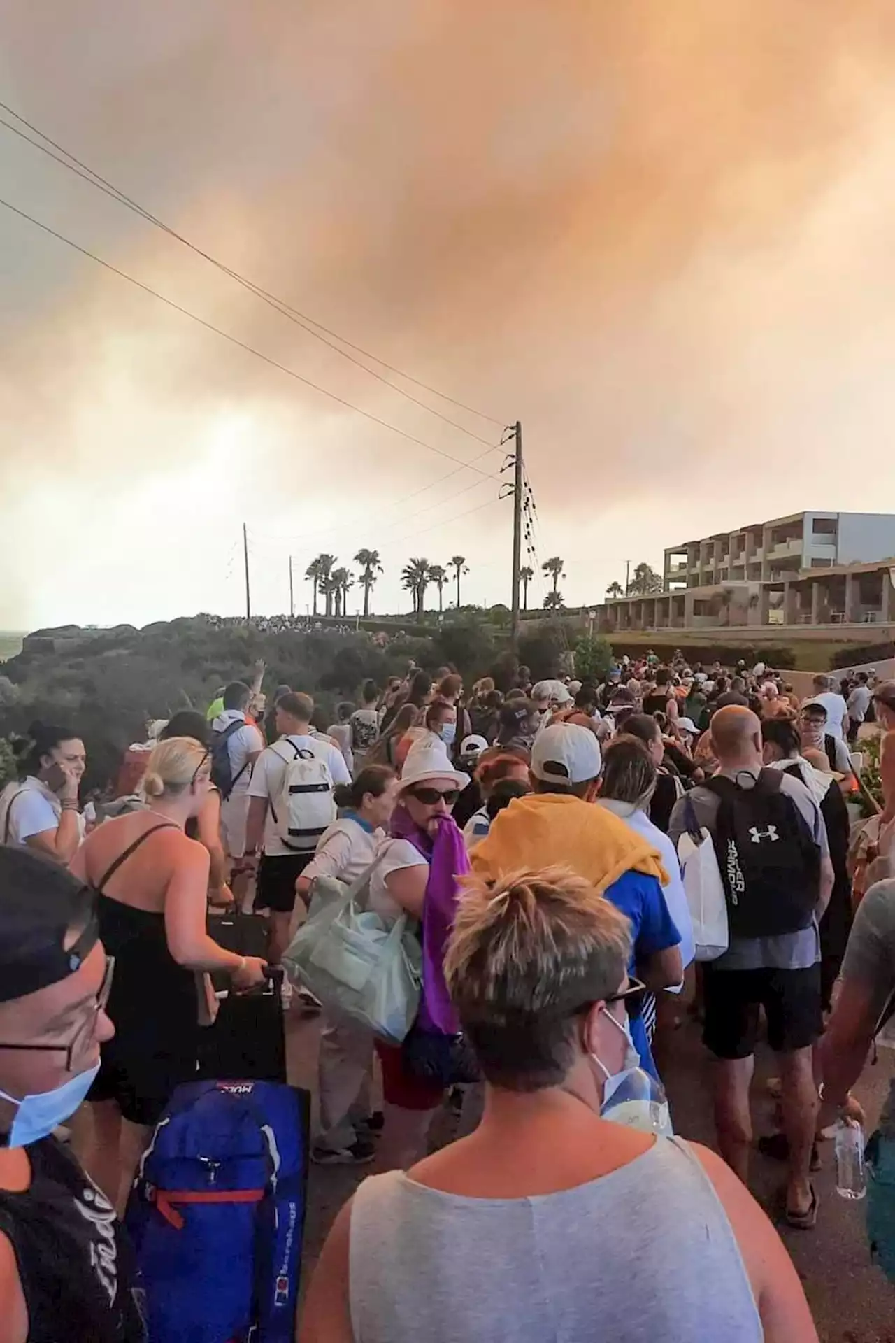 British tourists among thousands forced to flee Rhodes inferno amid warning fires could worsen