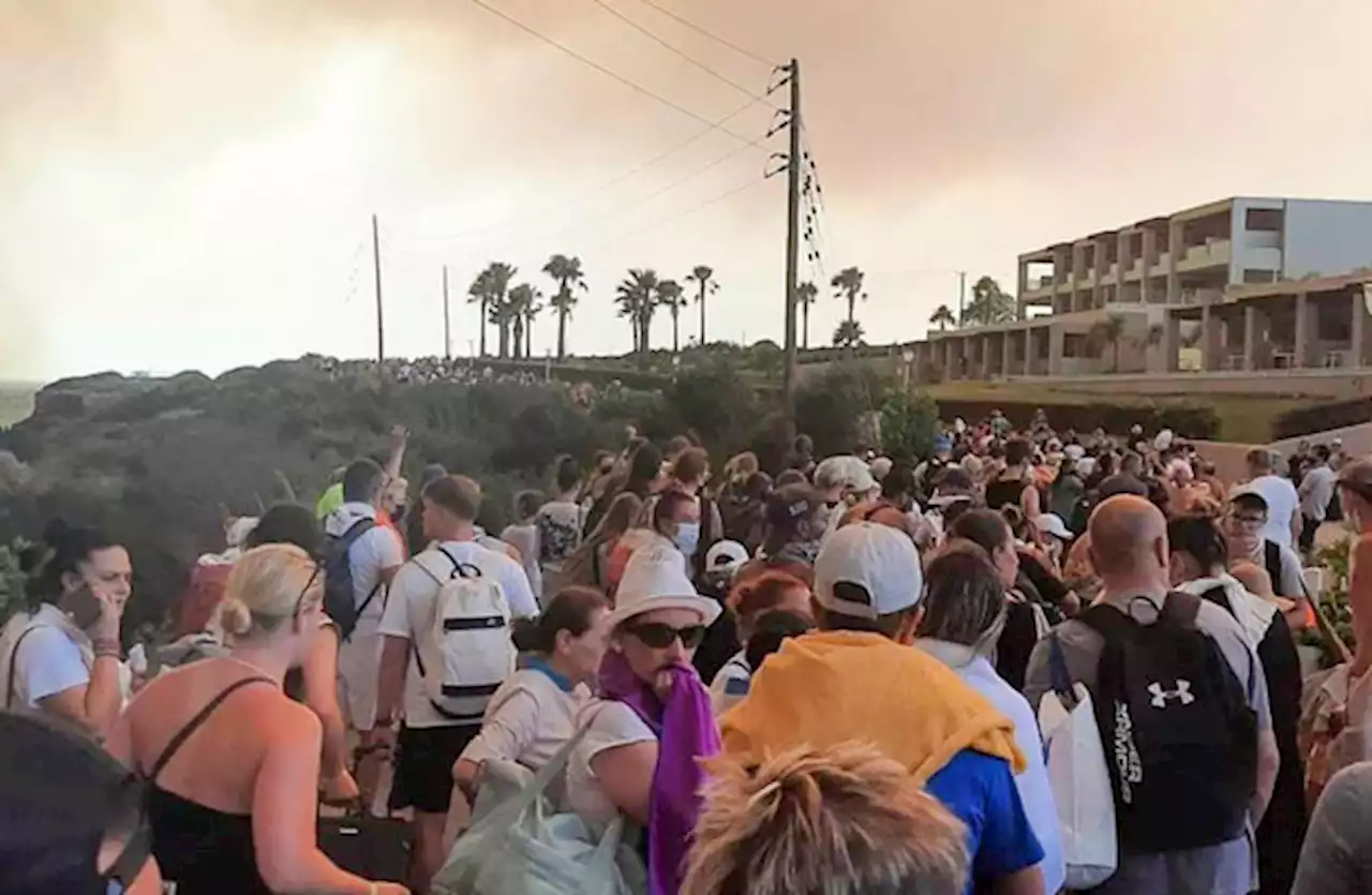 Rhodes wildfires prompt 'biggest ever fire evacuation' in Greece as 30,000 moved to safety