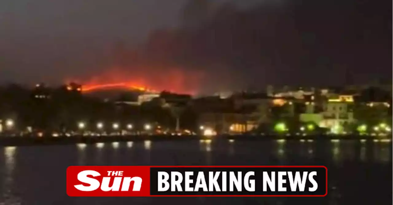 Raging wildfire spreads to second Greek hols island as tourists told to evacuate