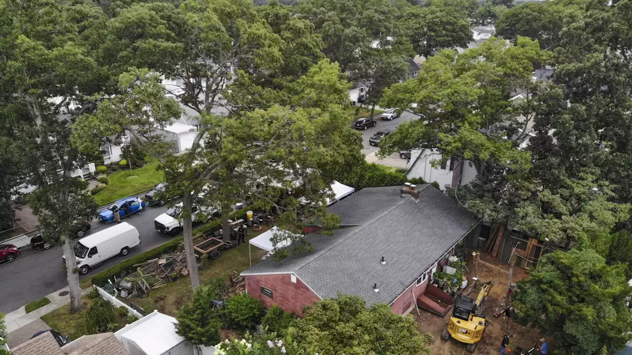 Excavator seen digging in backyard of man charged in Gilgo Beach killings