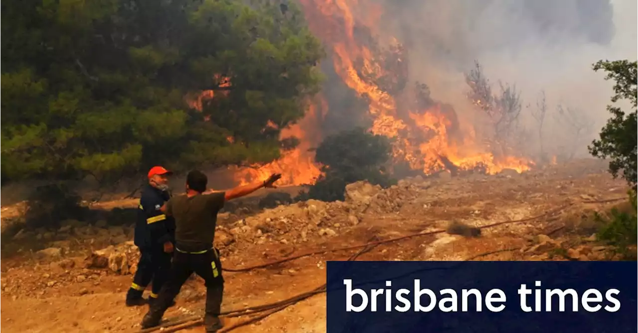 Fires blaze on island of Rhodes as dozens more start across Greece