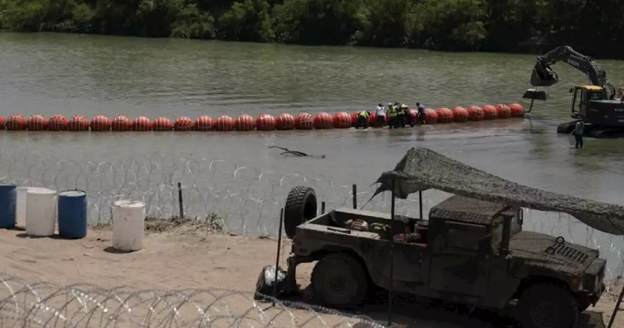 DOJ sues Texas over floating barrier in Rio Grande