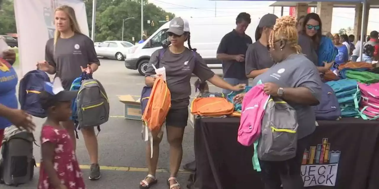 Community partners giveaway nearly 500 backpacks