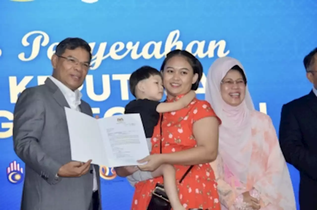 In Sarawak, tears of joy as mothers see children receive Malaysian citizenship