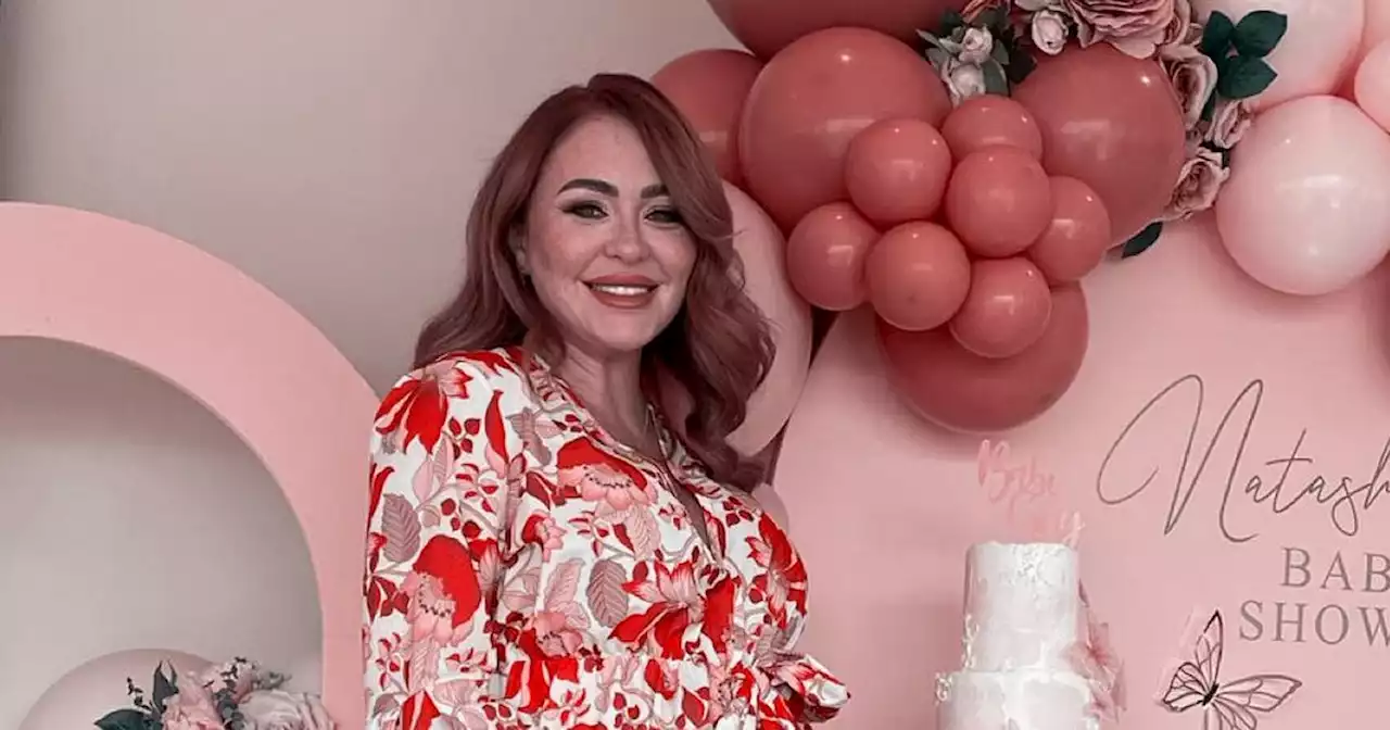 Natasha Hamilton's stunning pink baby shower with balloons and butterfly cake