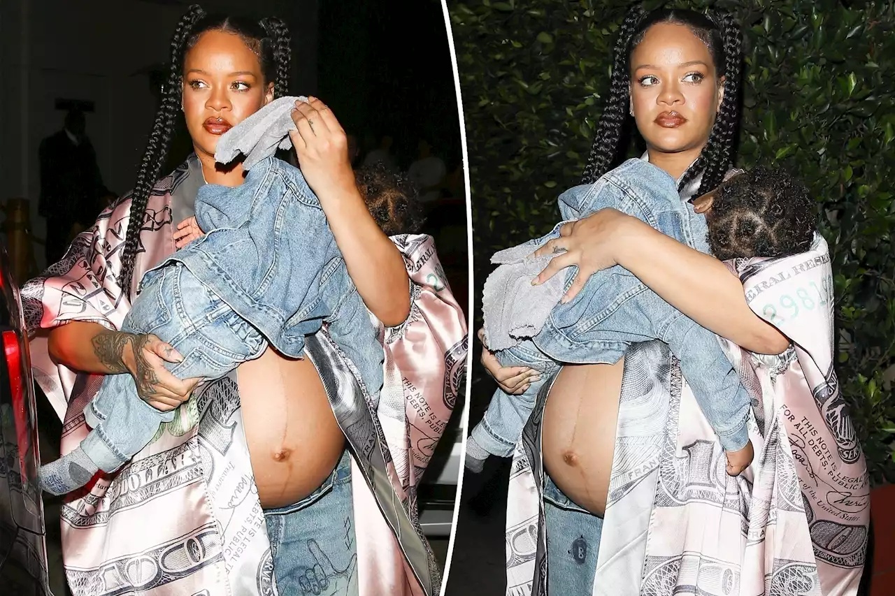 Pregnant Rihanna bares baby bump at dinner with son RZA