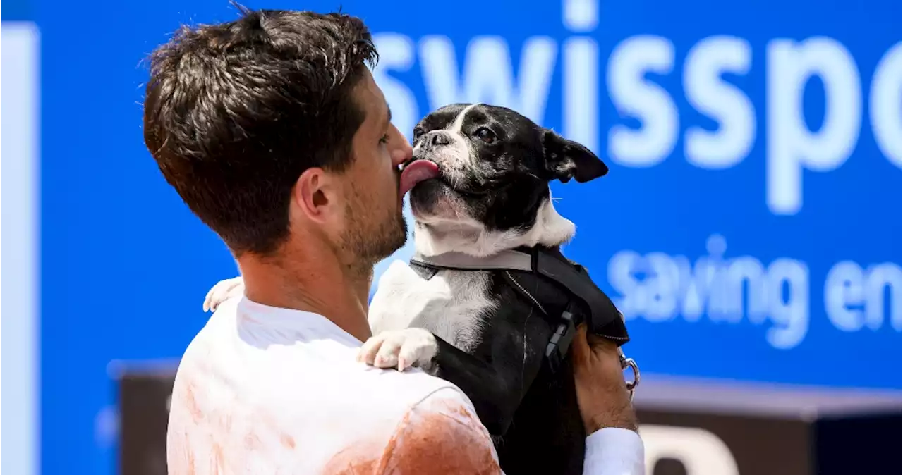 Pedro Cachín gana su primer título ATP en Suiza y lo celebra con su bulldog francés