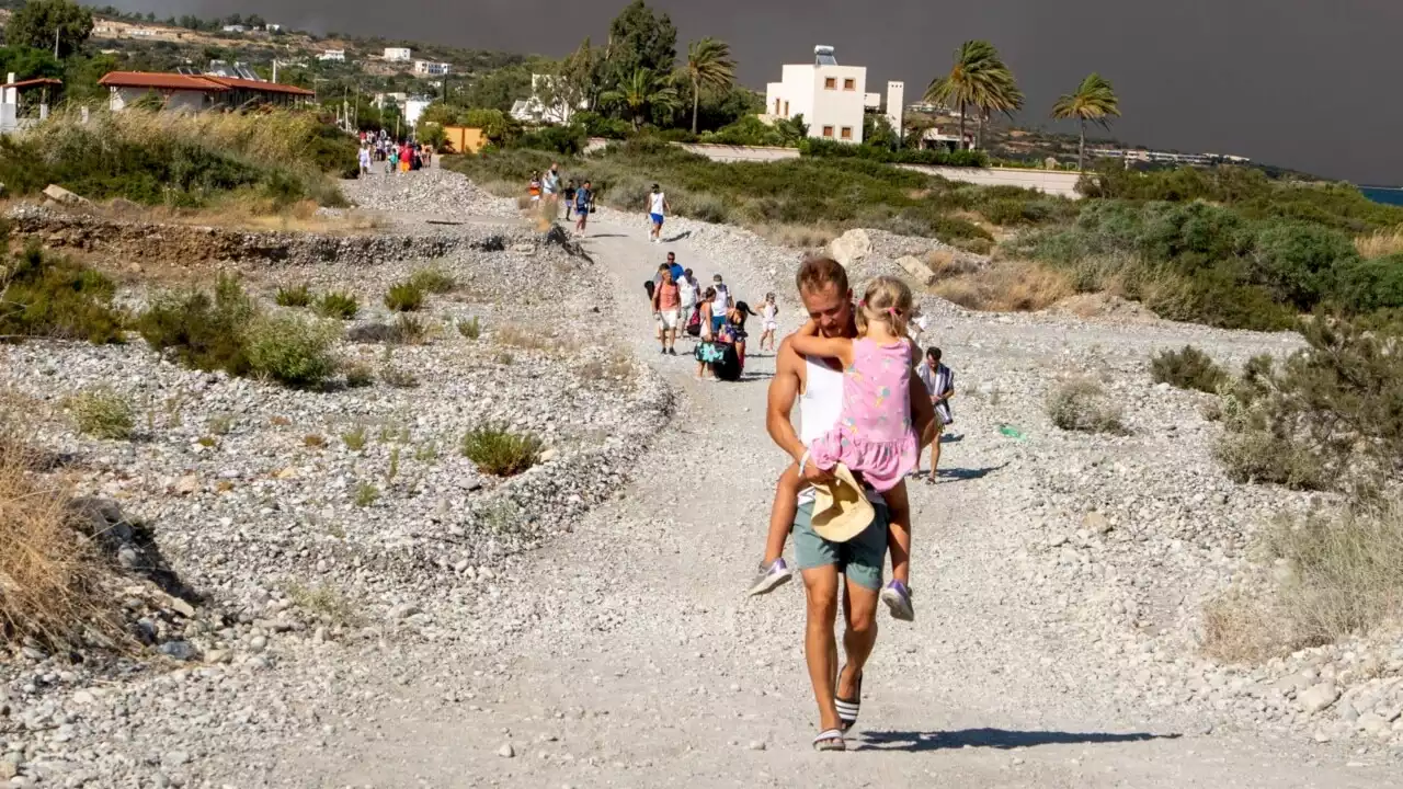 ‘The fire was catching up to us’: Terrified locals, tourists flee blaze on Greek island