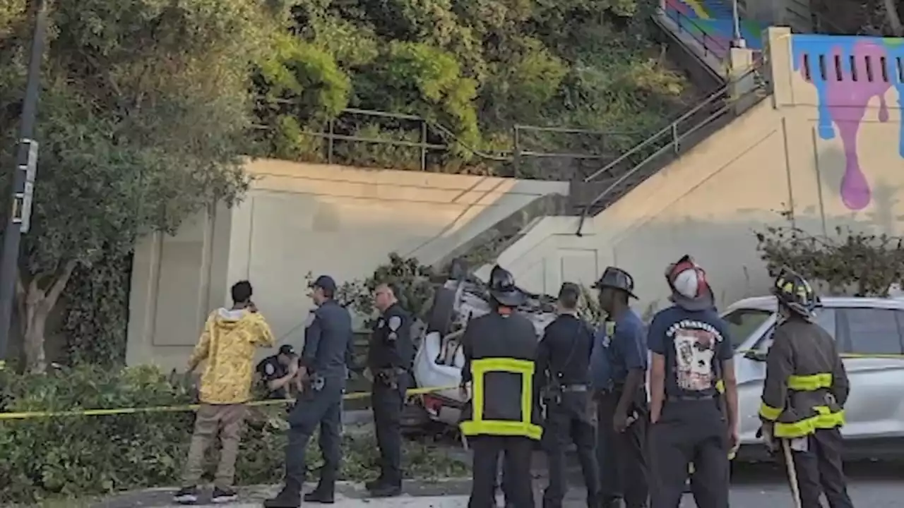 San Francisco crash: Vehicle tied to carjacking seen flipping down stairs