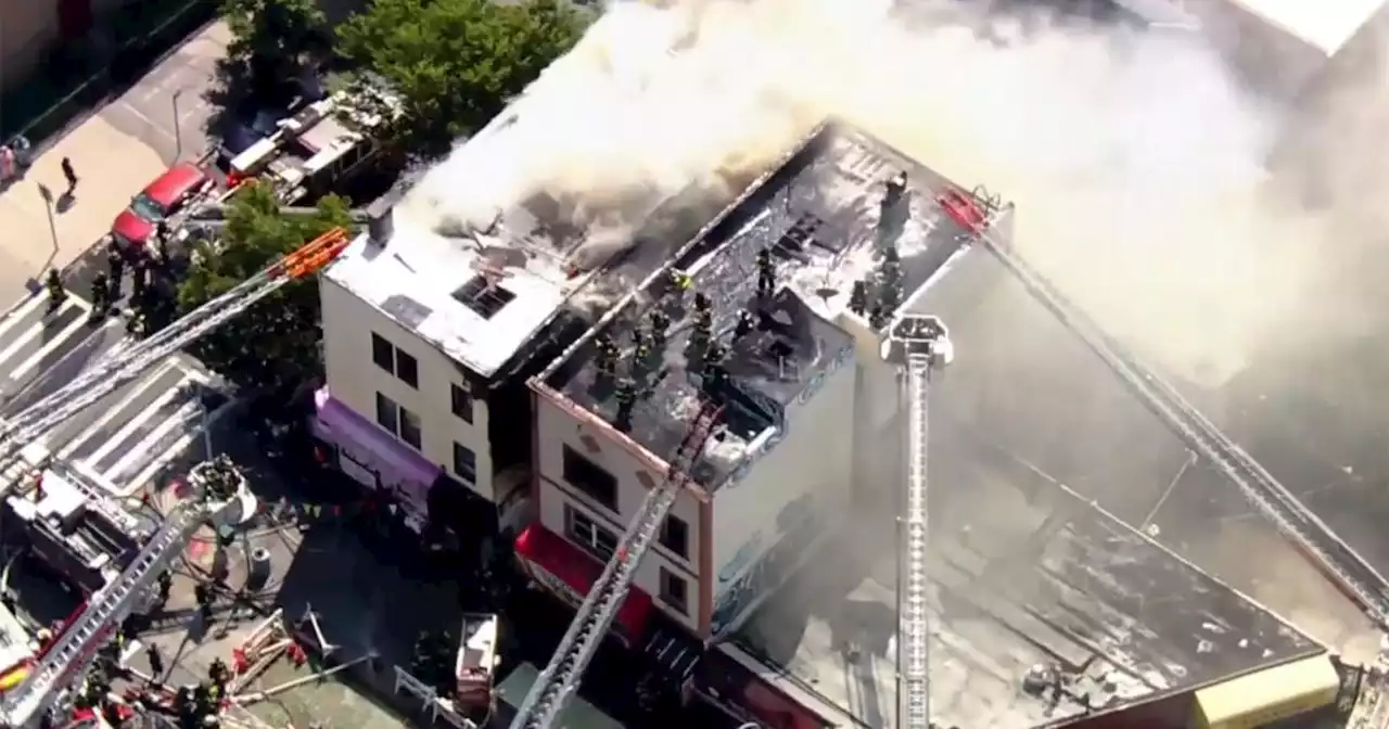 8 hospitalized including 7 firefighters after fire tears through building next to Cross Bronx Expressway