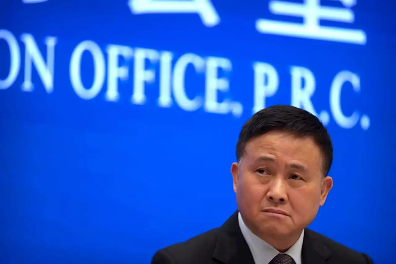 China names new central bank governor as economy flags