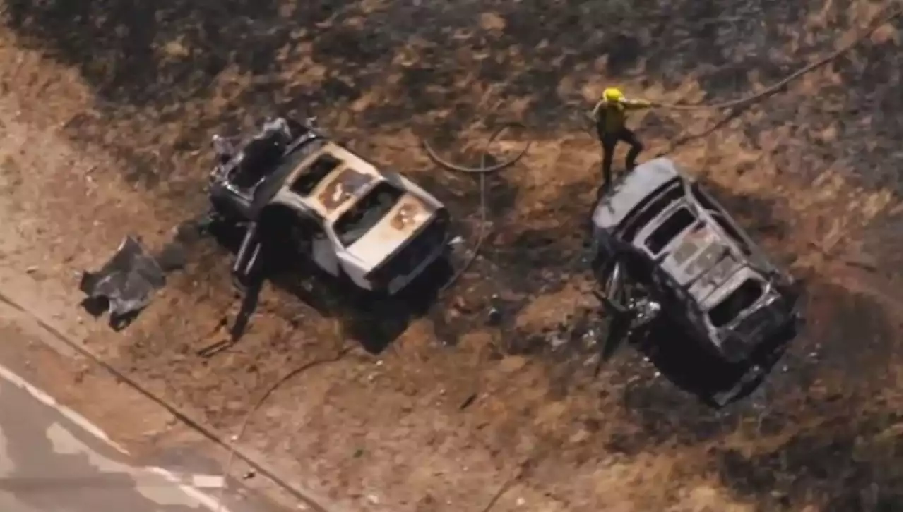 Fiery two-car crash after chase on 5 Freeway starts brush fire in Santa Clarita